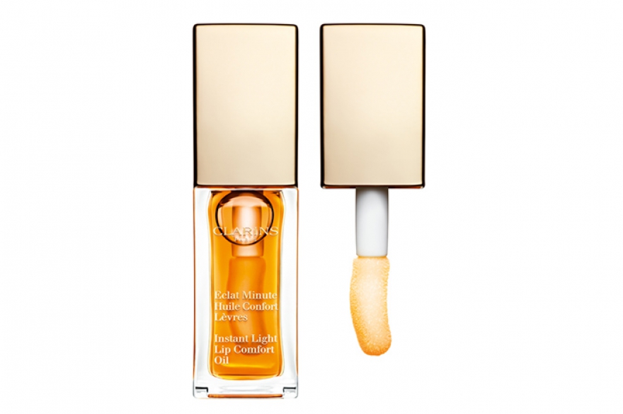 Eclat Minute, Clarins Clarins смешала всего два масла, зато третьим (сливы мирабель) окрасили средство для губ — получилась чистая органика, которую