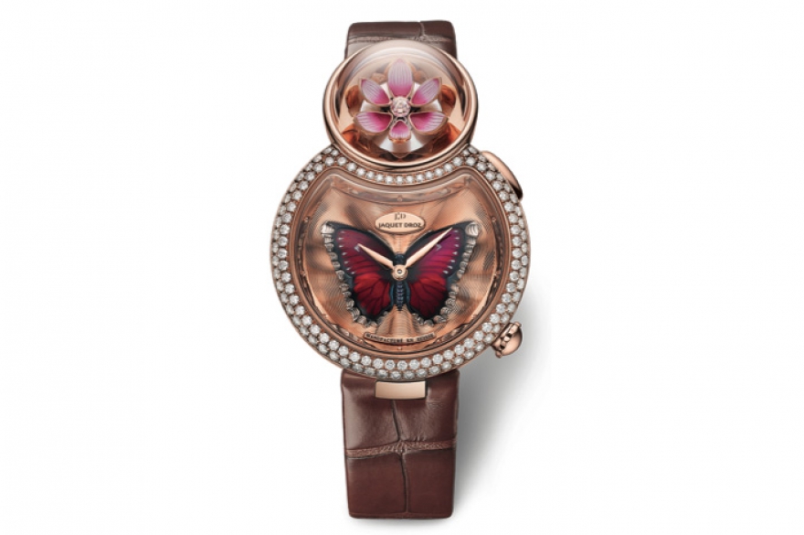 Lady 8 Flower Jaquet Droz Чтобы увидеть за эмалевыми лепестками распускающегося лотоса бриллиантовые тычинки, нужно нажать на кнопку автоматона часов