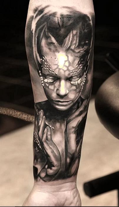 Татуировка с изображением персонажа Жени