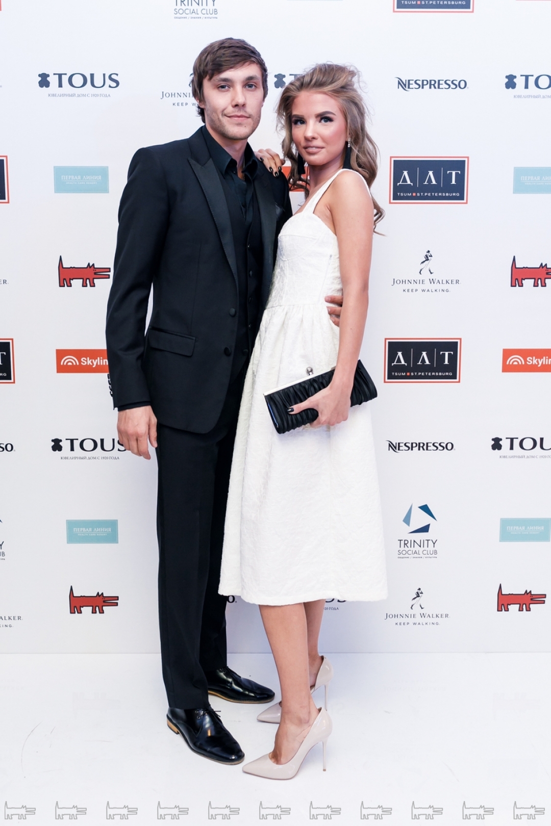 Александр Сергеенко со спутницей