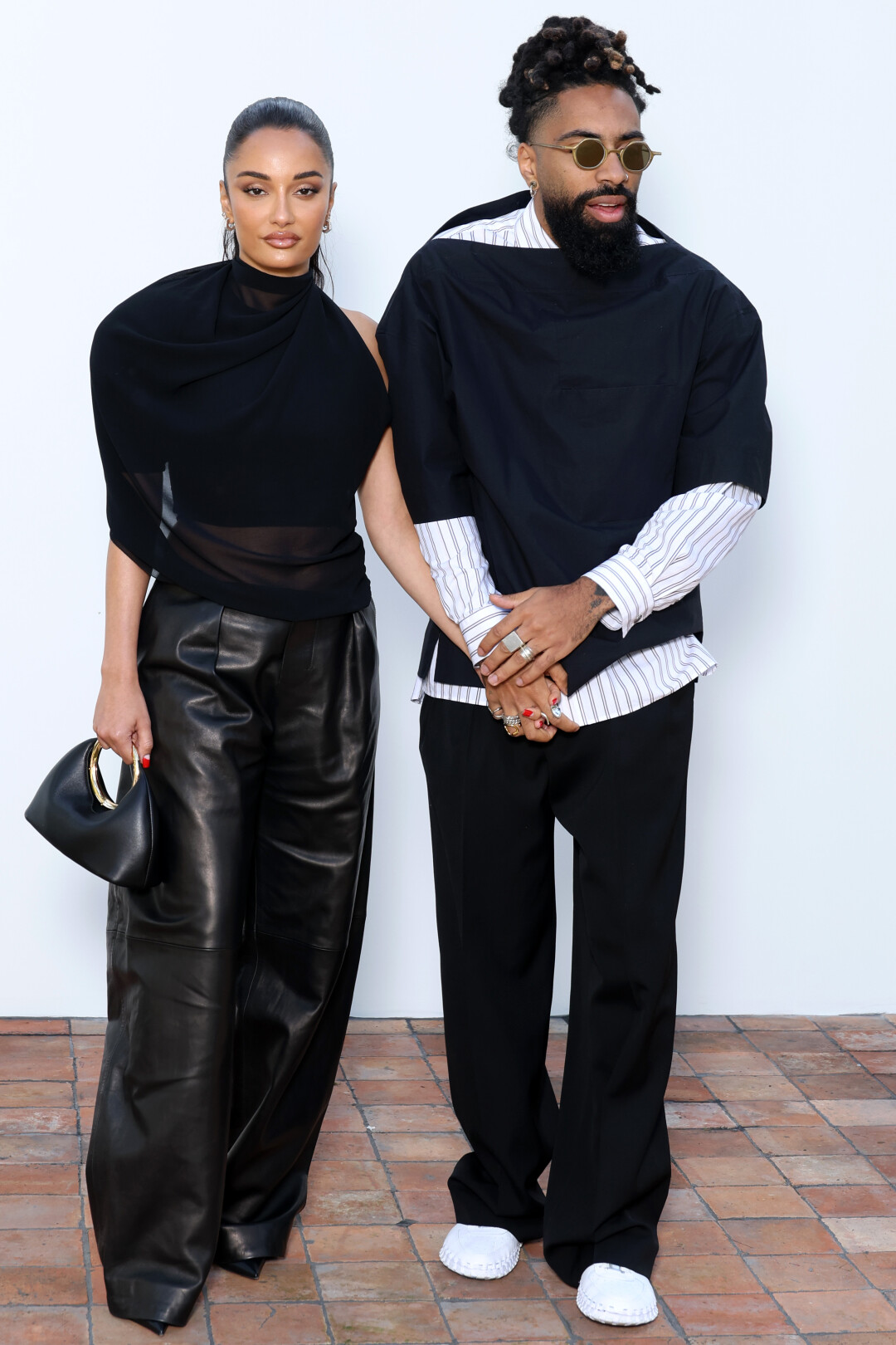 Амина Муадди со спутником