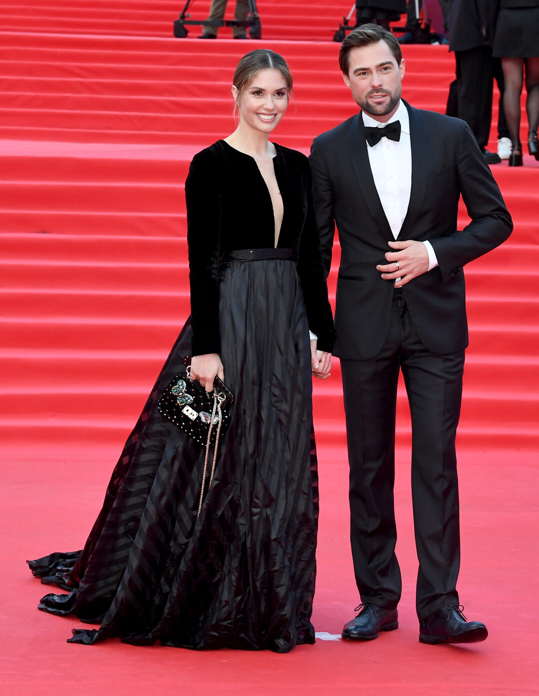 Агата Муцениеце в серьгах Mercury из коллекции Flower и Иван Чуйков