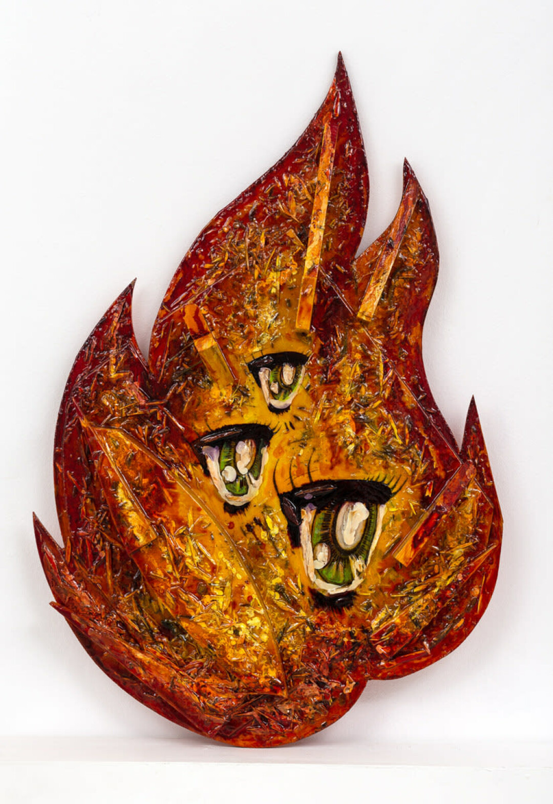 «Глаза огня». Дерево, пирография, акрил, морилка, лак, опилки, щепа. 2023