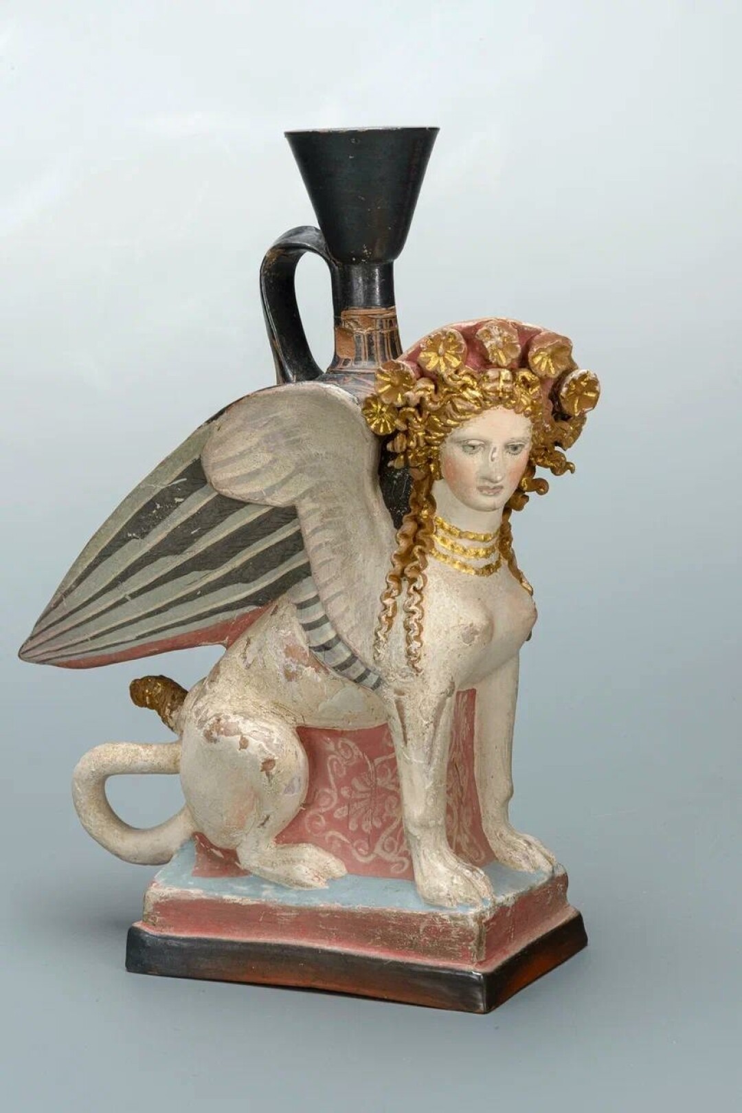 Сосуд фигурный в виде сидящего сфинкса. IV век до н.э.