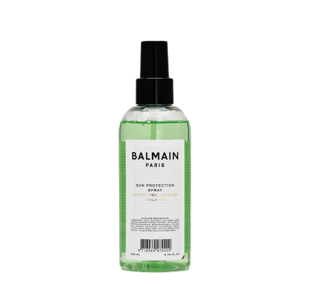 Солнцезащитный спрей для волос Balmain Paris Hair Couture с UVA- и UVB-фильтрами противостоит травмирующему воздействию солнца, морской воды и хлора