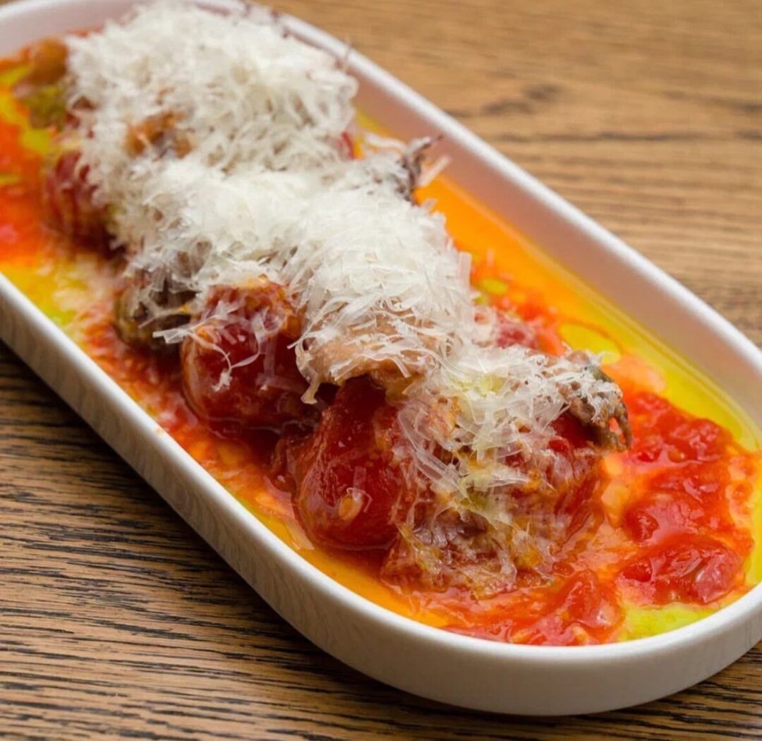 Томаты кимчи с кальмаром в Noisy Bar & Kitchen