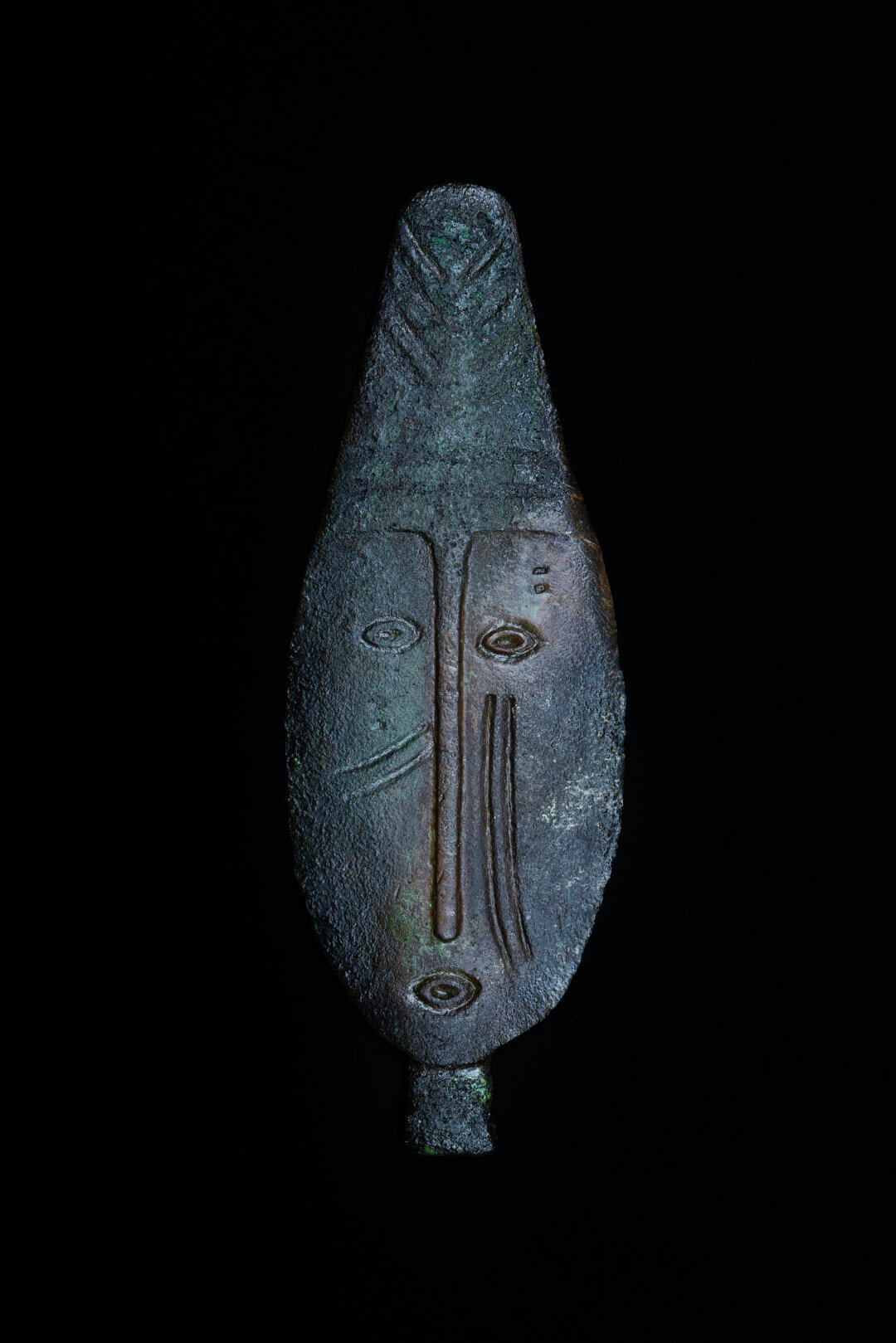 Личина в головном уборе типа шлема. VI в. до.н.э. – V в.н.э. Бронза, литье Томский краеведческий музей им. М. Б. Шатилова