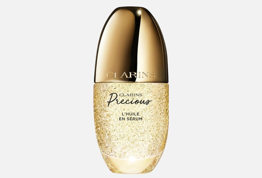 Ночная восстанавливающая сыворотка-масло для лица CLARINS PRECIOUS, Золотое яблоко, 38 600 руб.