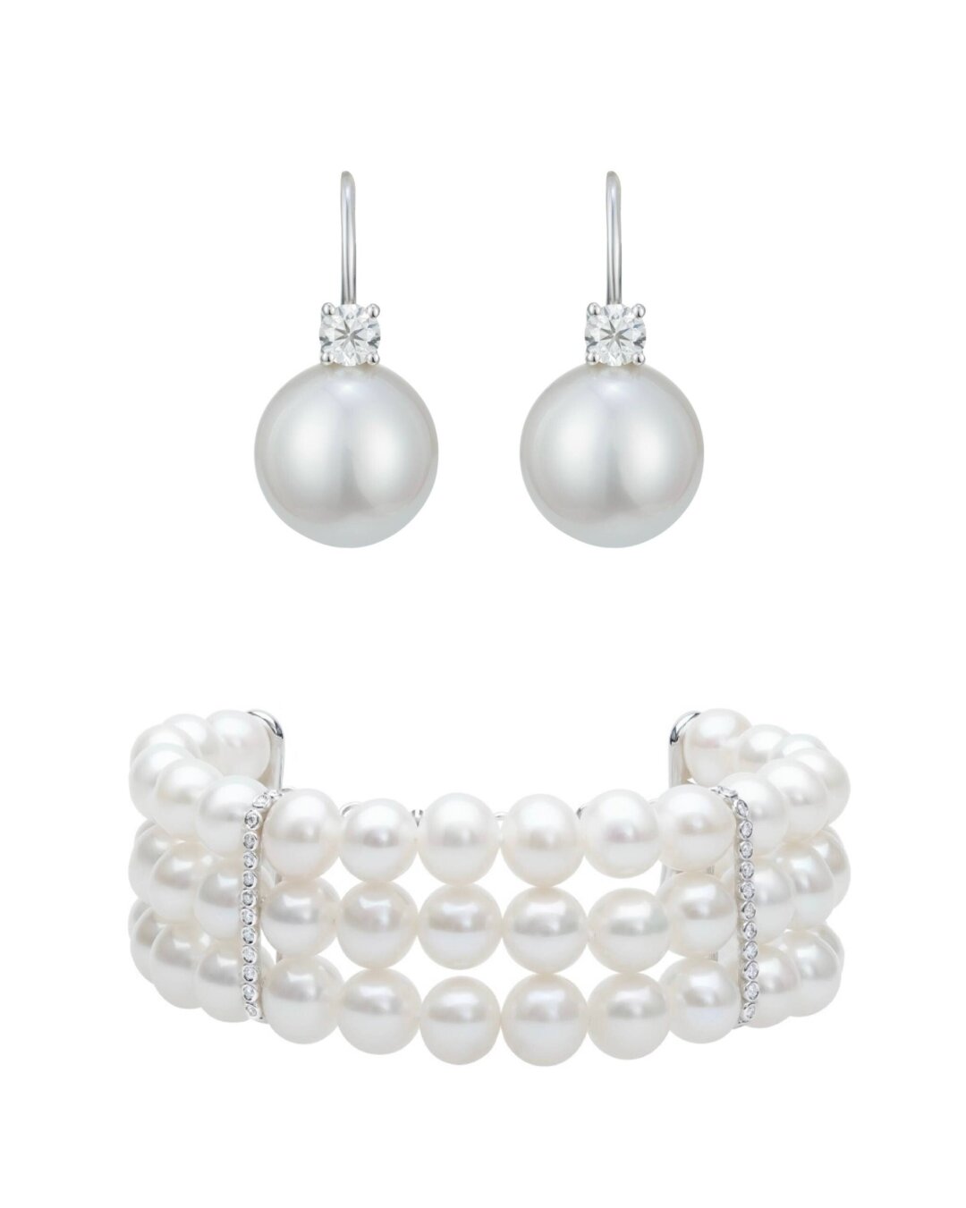 На Екатерине: серьги из белого золота с жемчугом и бриллиантами круглой огранки. Их дополнил многорядный браслет из трех нитей жемчуга со спейсерами с