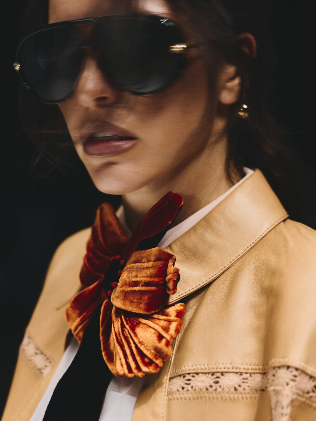 Zivert в кожаной куртке MVST и блузе Valentino